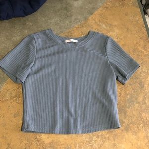 This is a blue grey crop top. New, never worn but no tags.